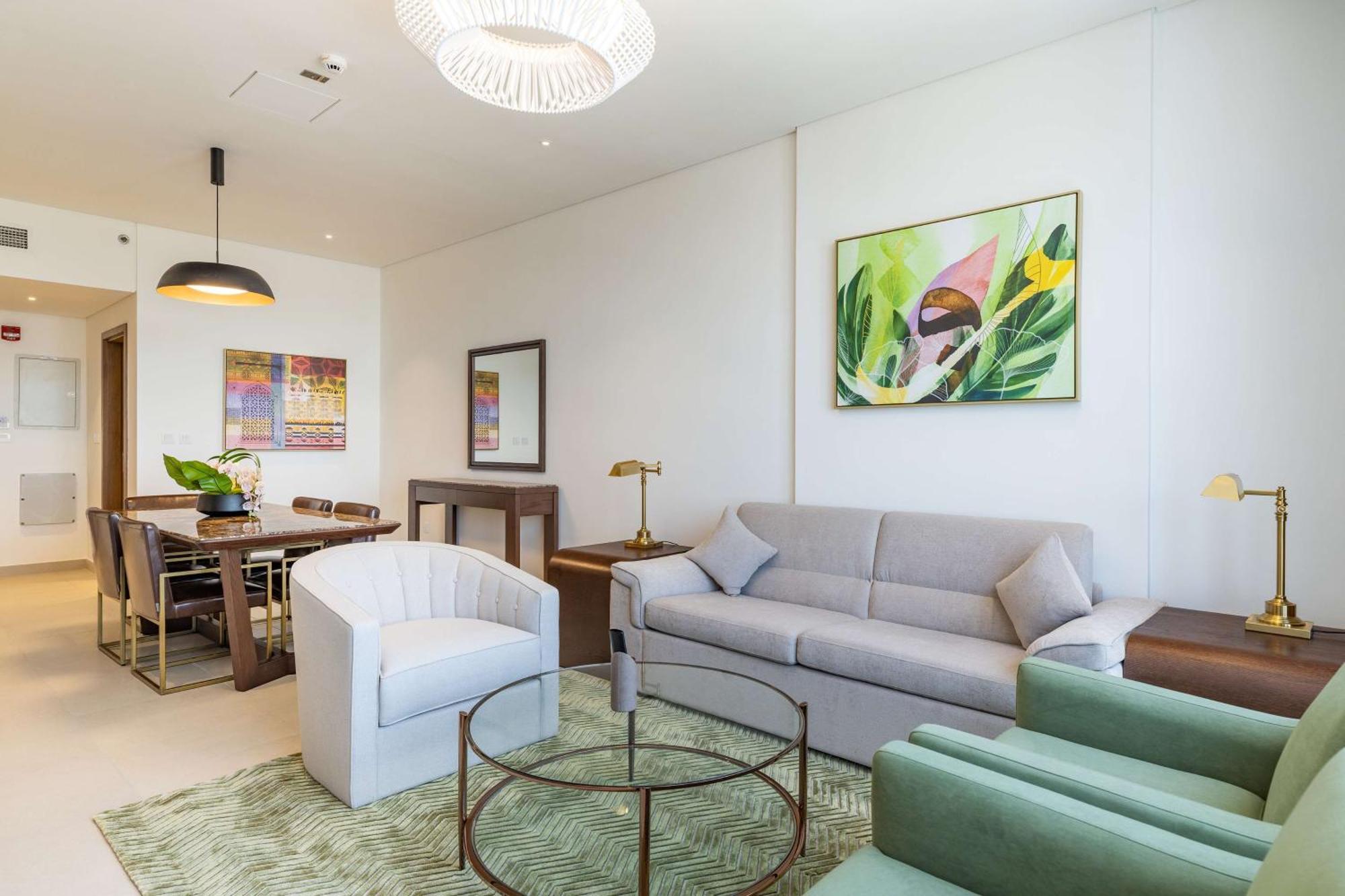 Doubletree By Hilton Doha Downtown Hotel Buitenkant foto A living room in a private villa at Jumeirah at Saadiyat Island Resort, Abu Dhabi, United Arab Emirates